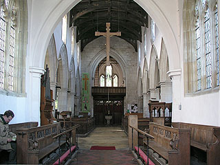 ben makes notes in the chancel